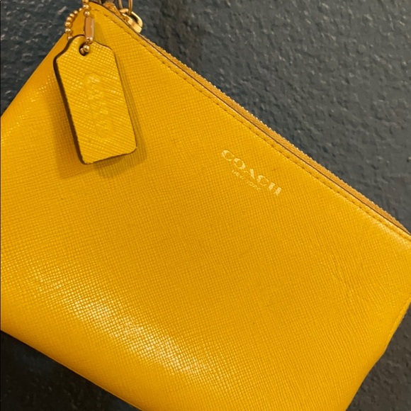 Coach Handbags - Yellow Coach Wristlet - Corner Zip